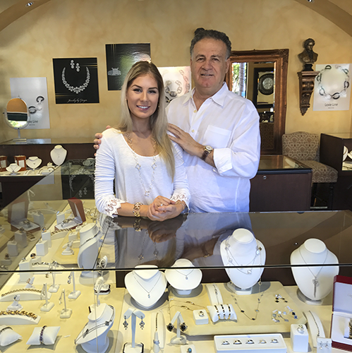 Jeweler Giorgio Salameh with his daughter at his jewelry shop located in Sarasota, Florida